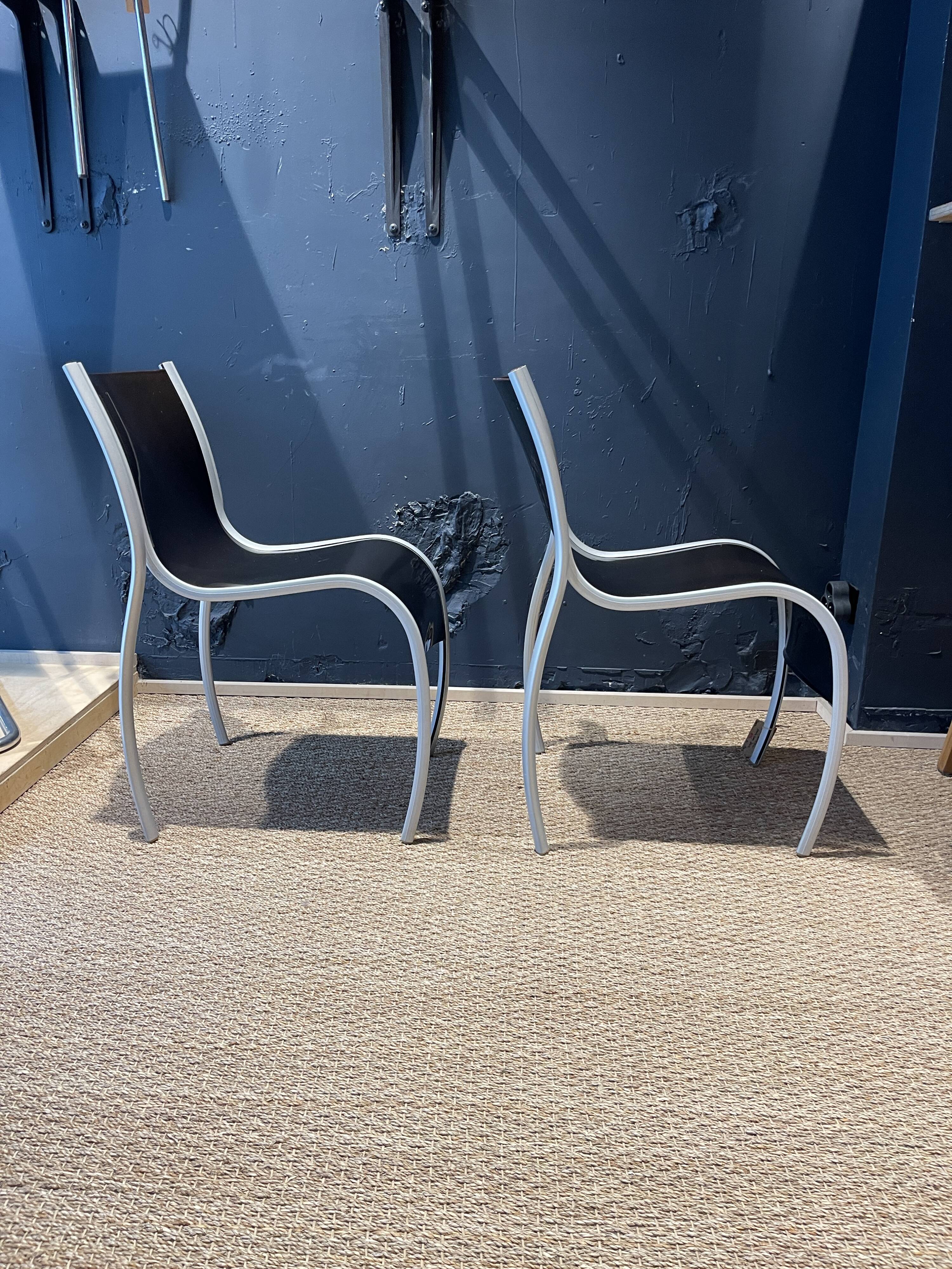 Pair of FPE chairs by Ron Arad for Kartell black Italy 2000s