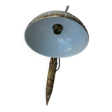 Art Nouveau wall light in bronze with a white Haviland porcelain shade.