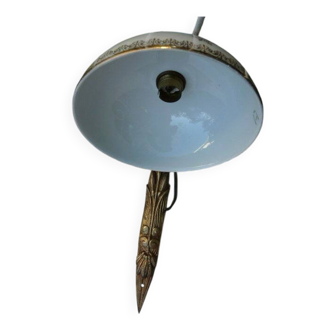 Art Nouveau wall light in bronze with a white Haviland porcelain shade.