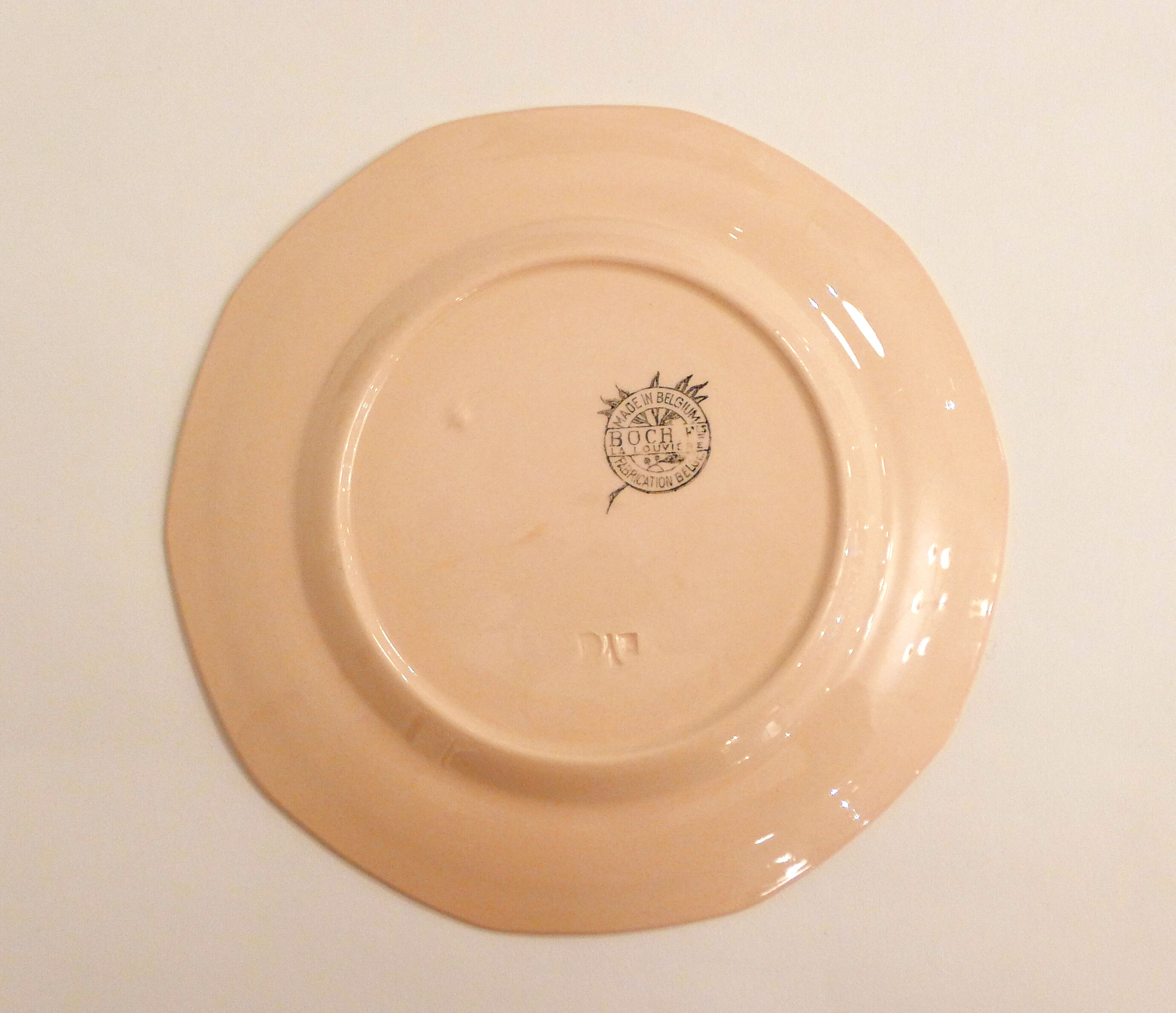 Set of 9 pink plates by Boch la Louvière