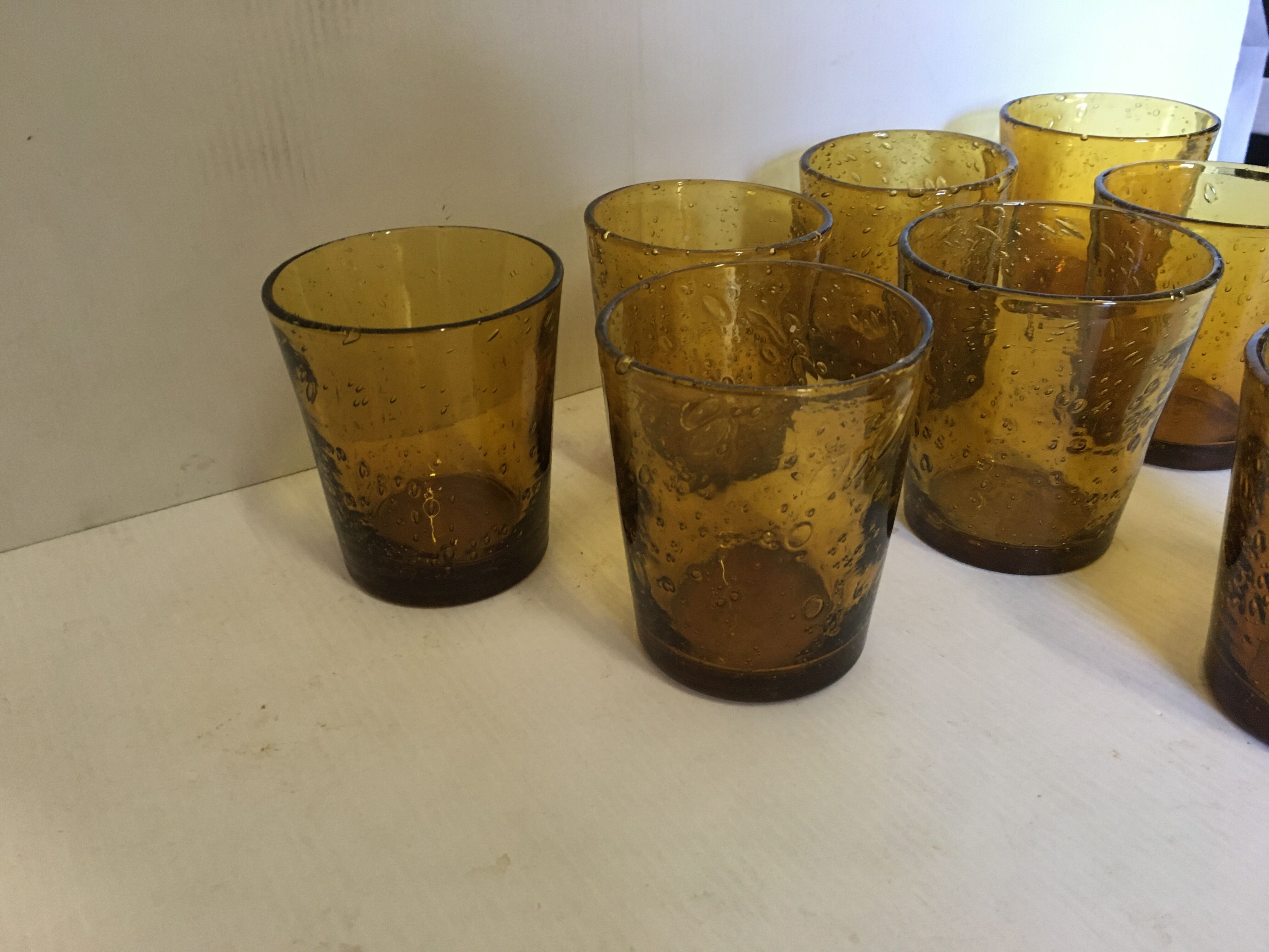 8 glasses with amber bubbled blown glass water