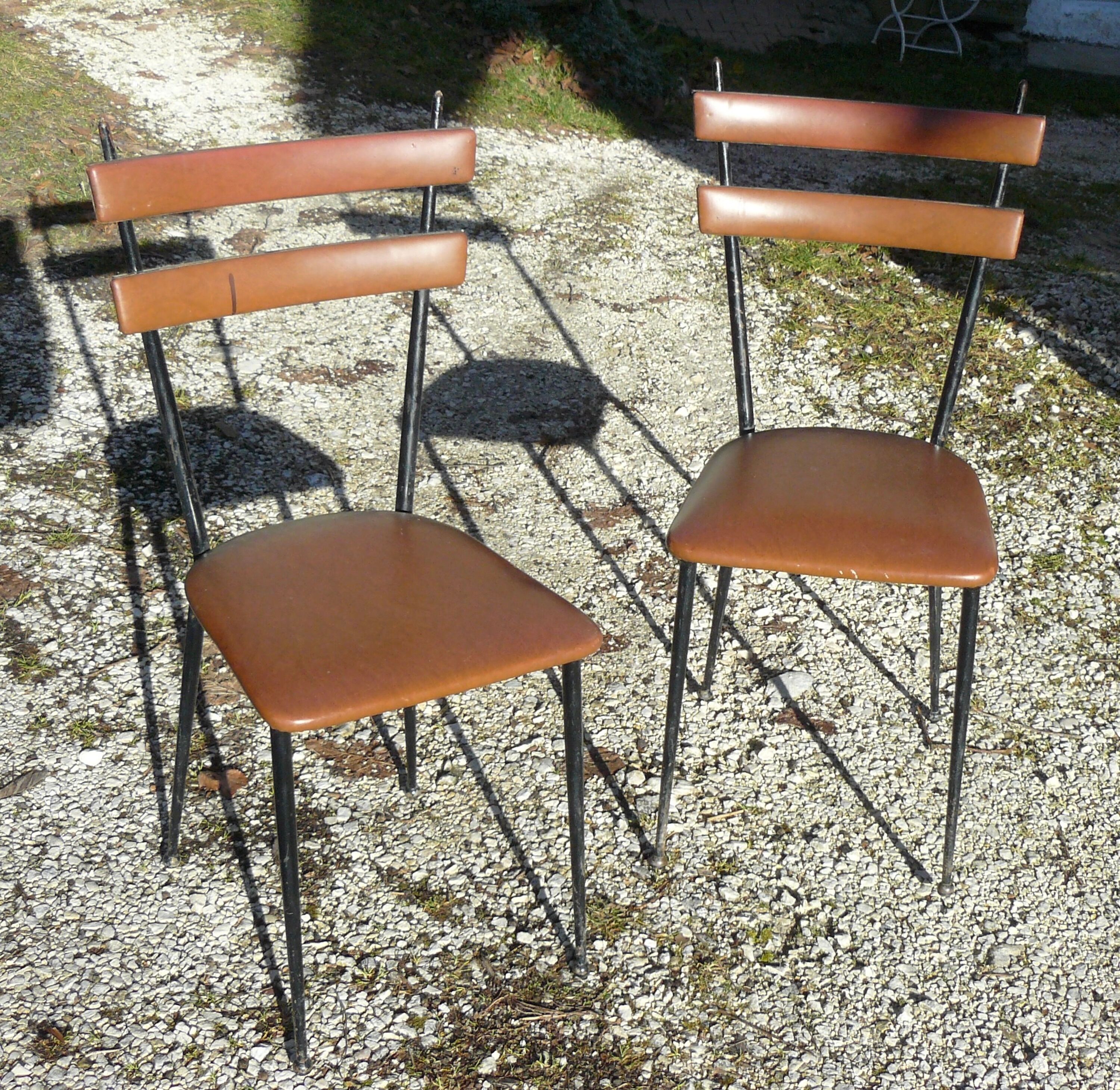 Pair of metal and imitation leather chairs 1950