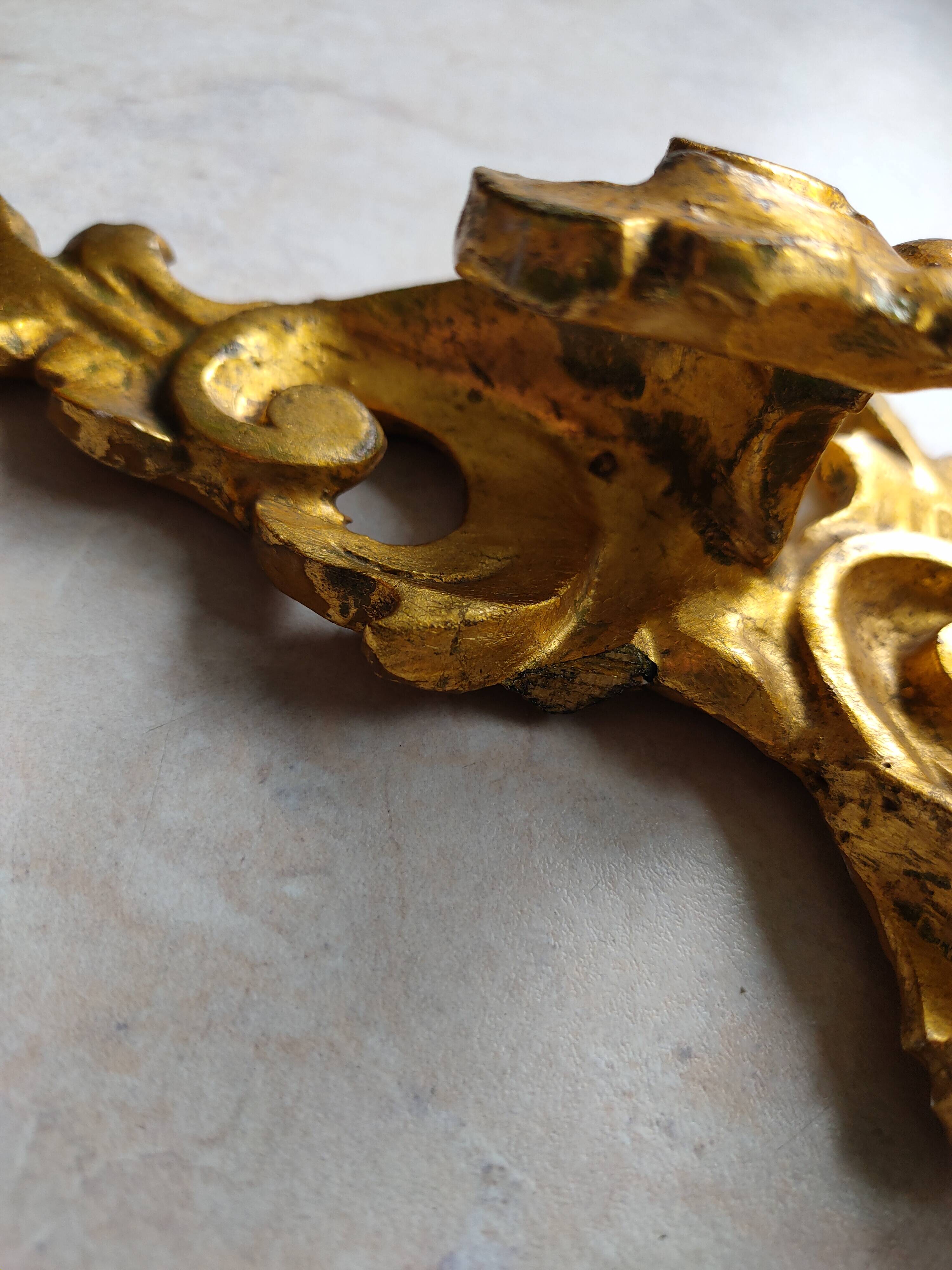 Baroque style golden shelf.