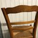 6 old straw chairs