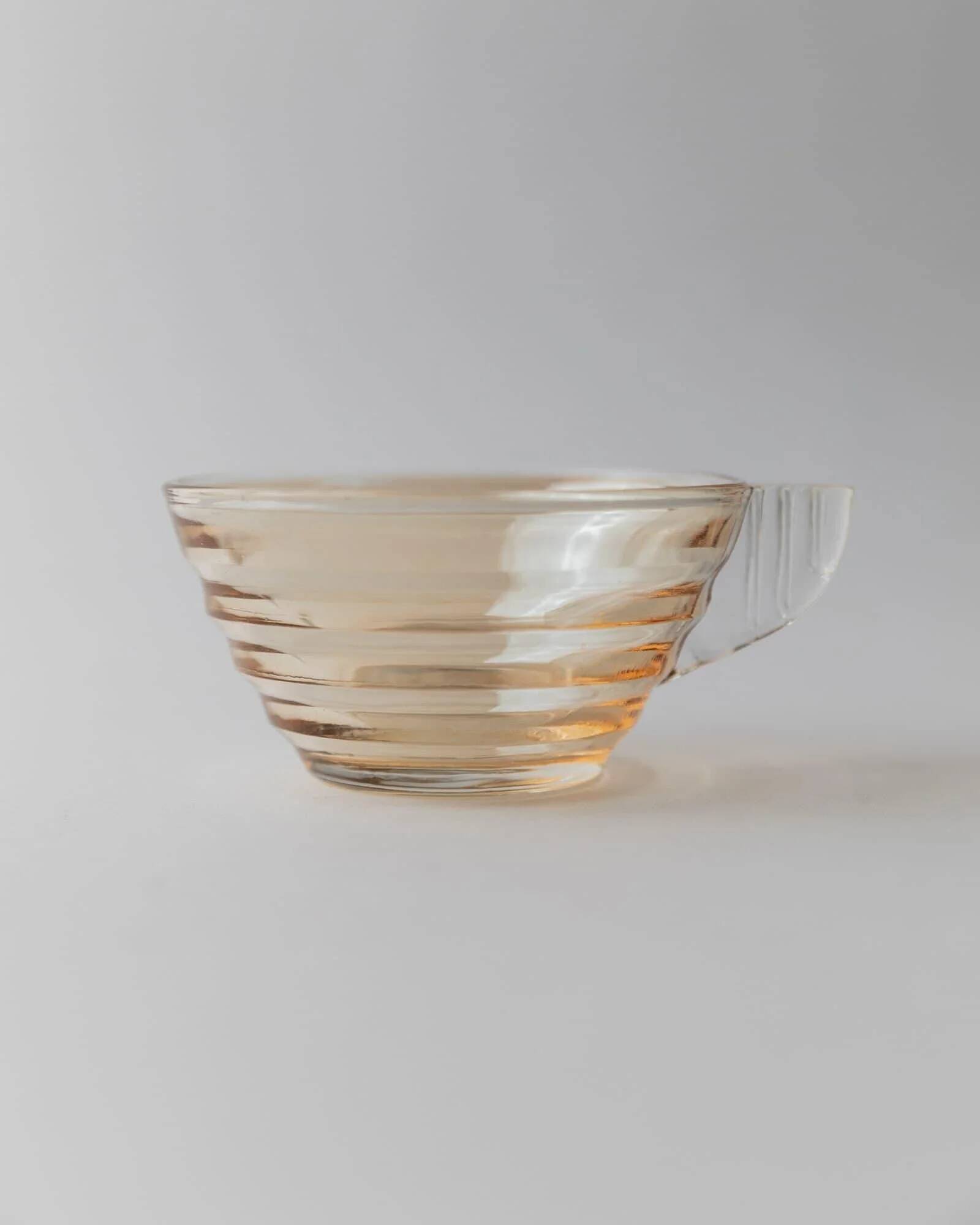 Vintage 1950s glass coffee cups, set of 5, iridescent peach ribbed glass with saucers, Italian design Gondolo.