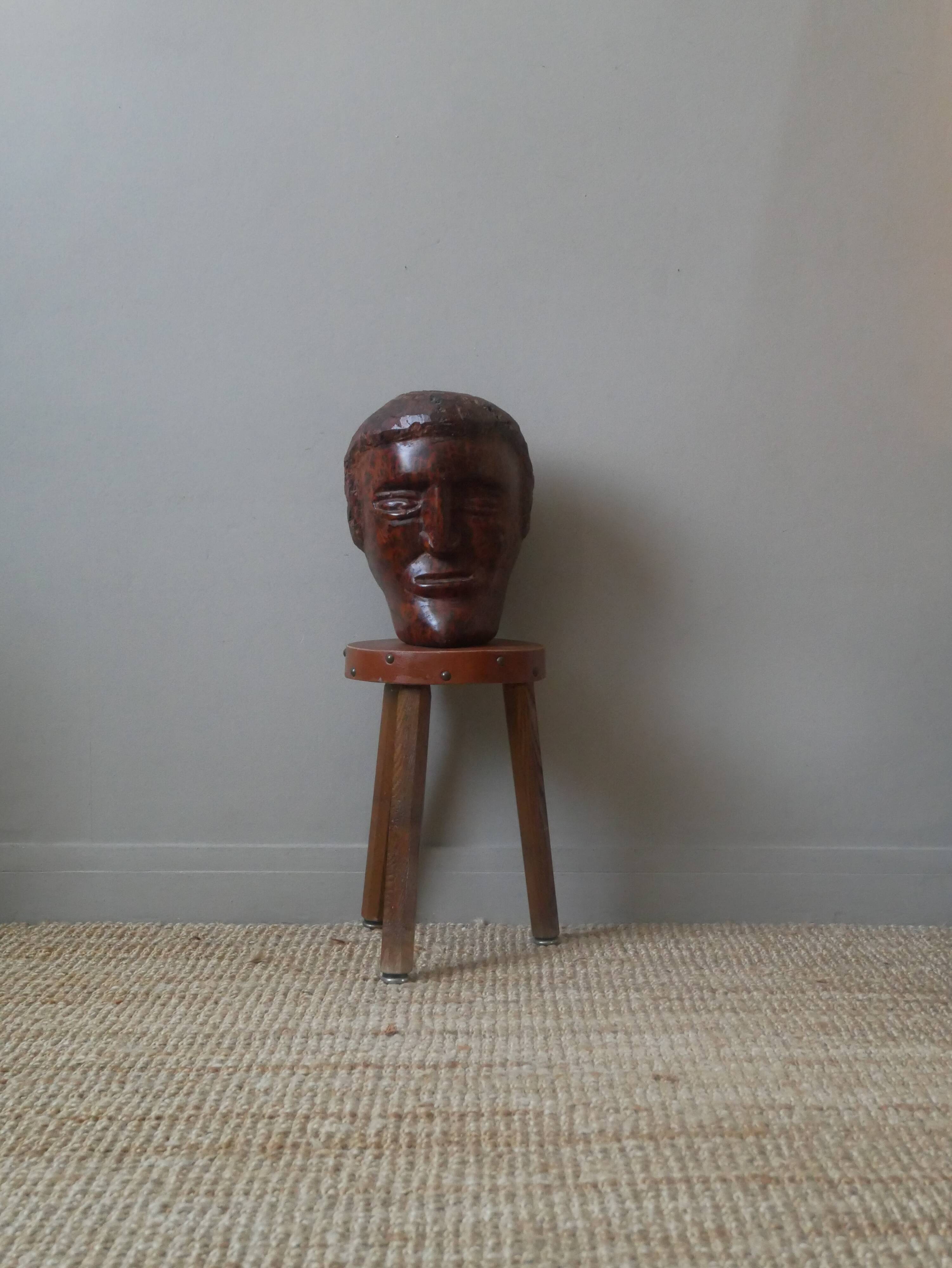Wooden sculpture ethnic man's head handcrafted tribal decorative object workshop