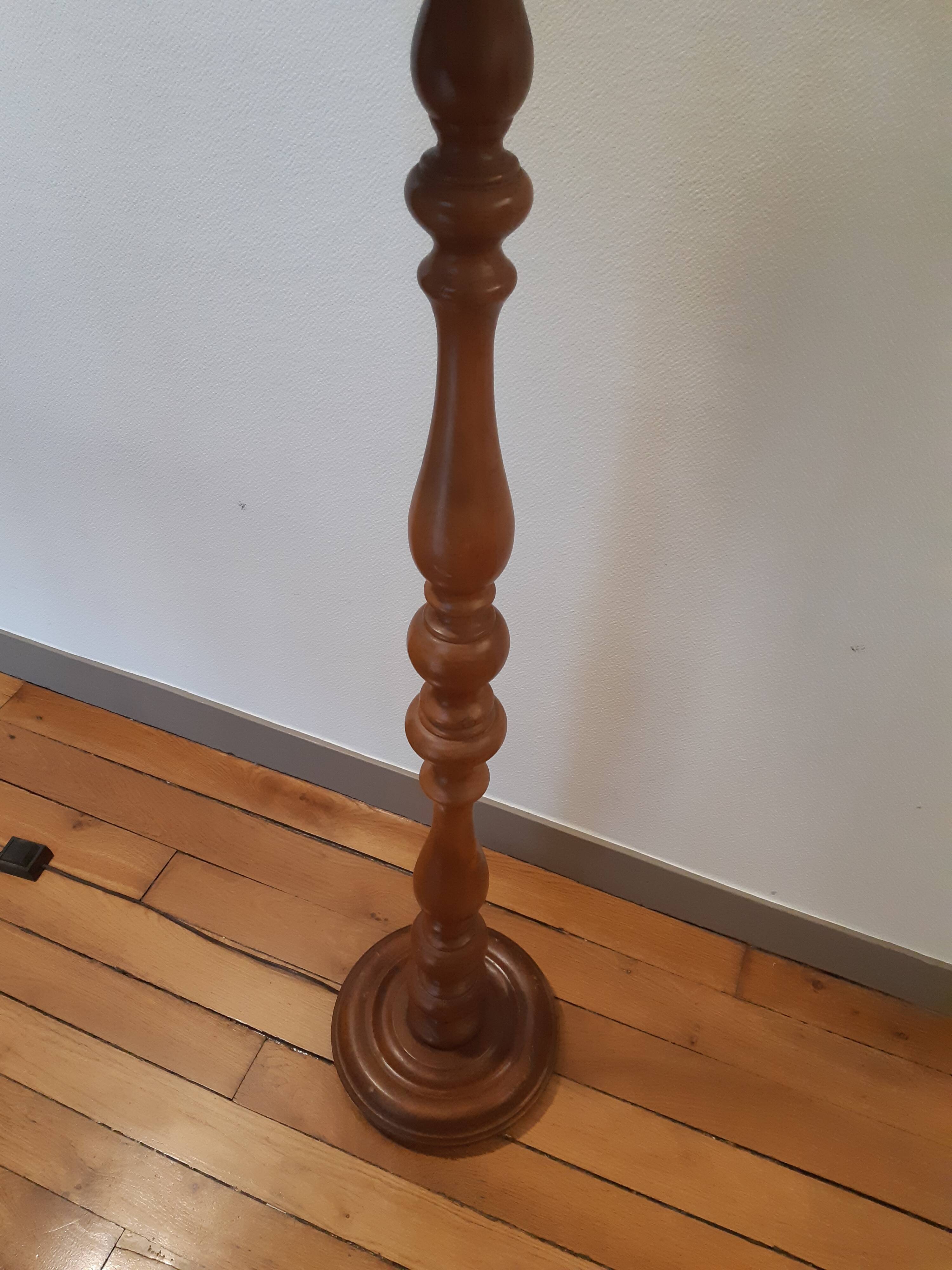 Carved wooden lamppost