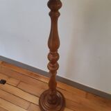 Carved wooden lamppost