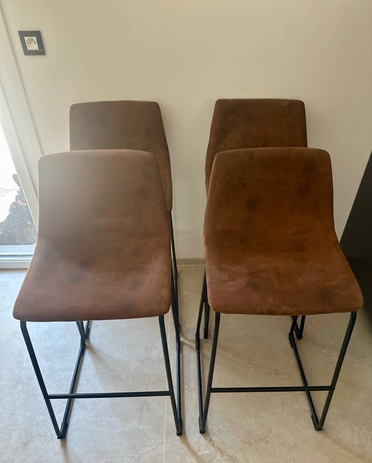 Bar stool in metal and aged leather