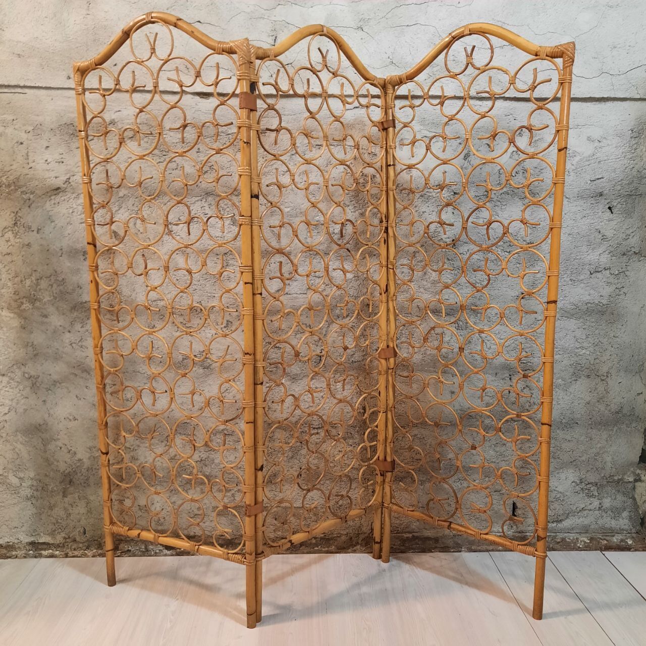 Vintage screen made of bamboo, wicker and leather
