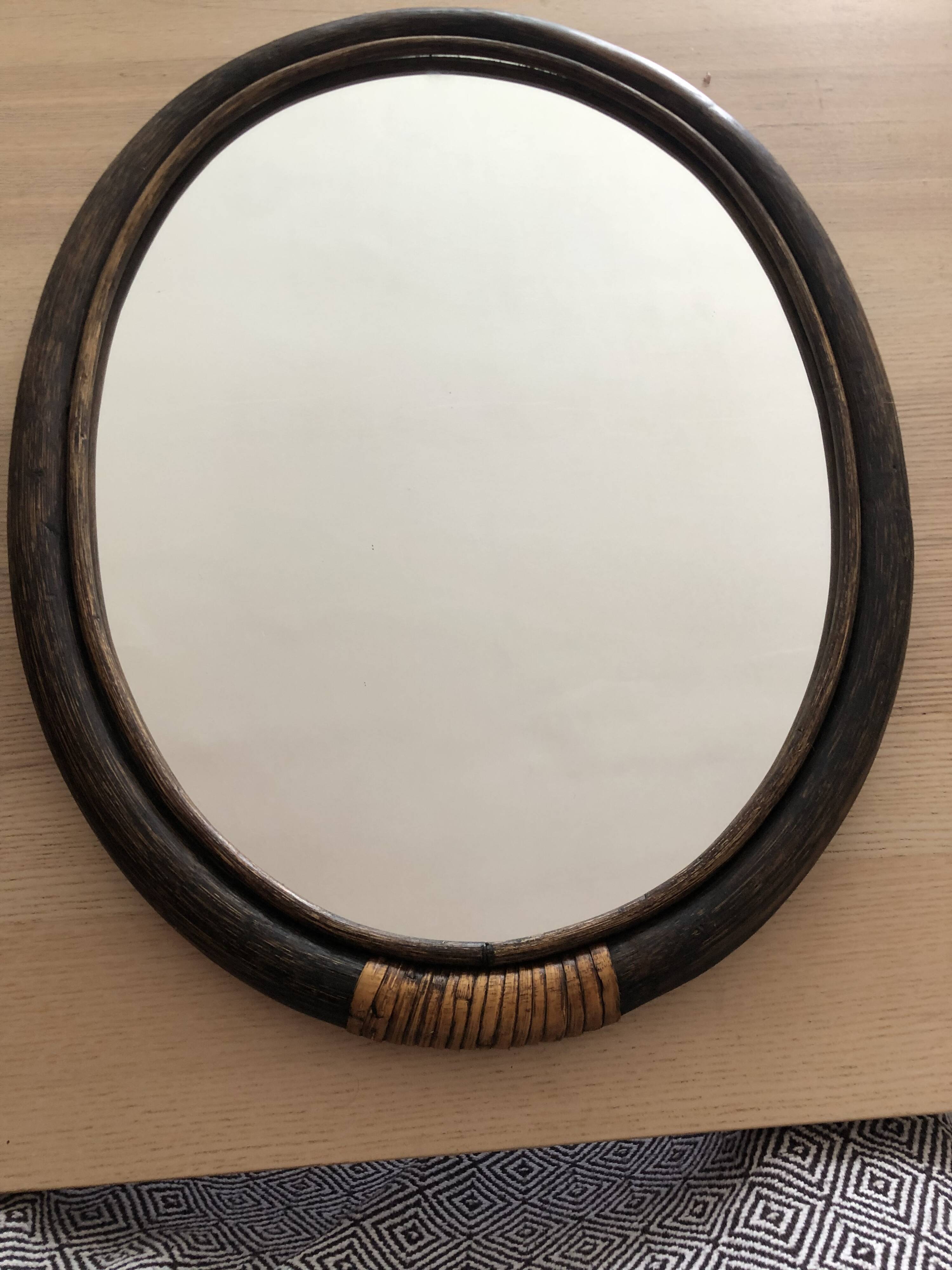 Oval rattan mirror