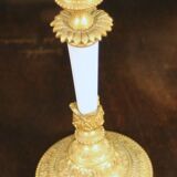 Pair of bronze and white opaline candlesticks