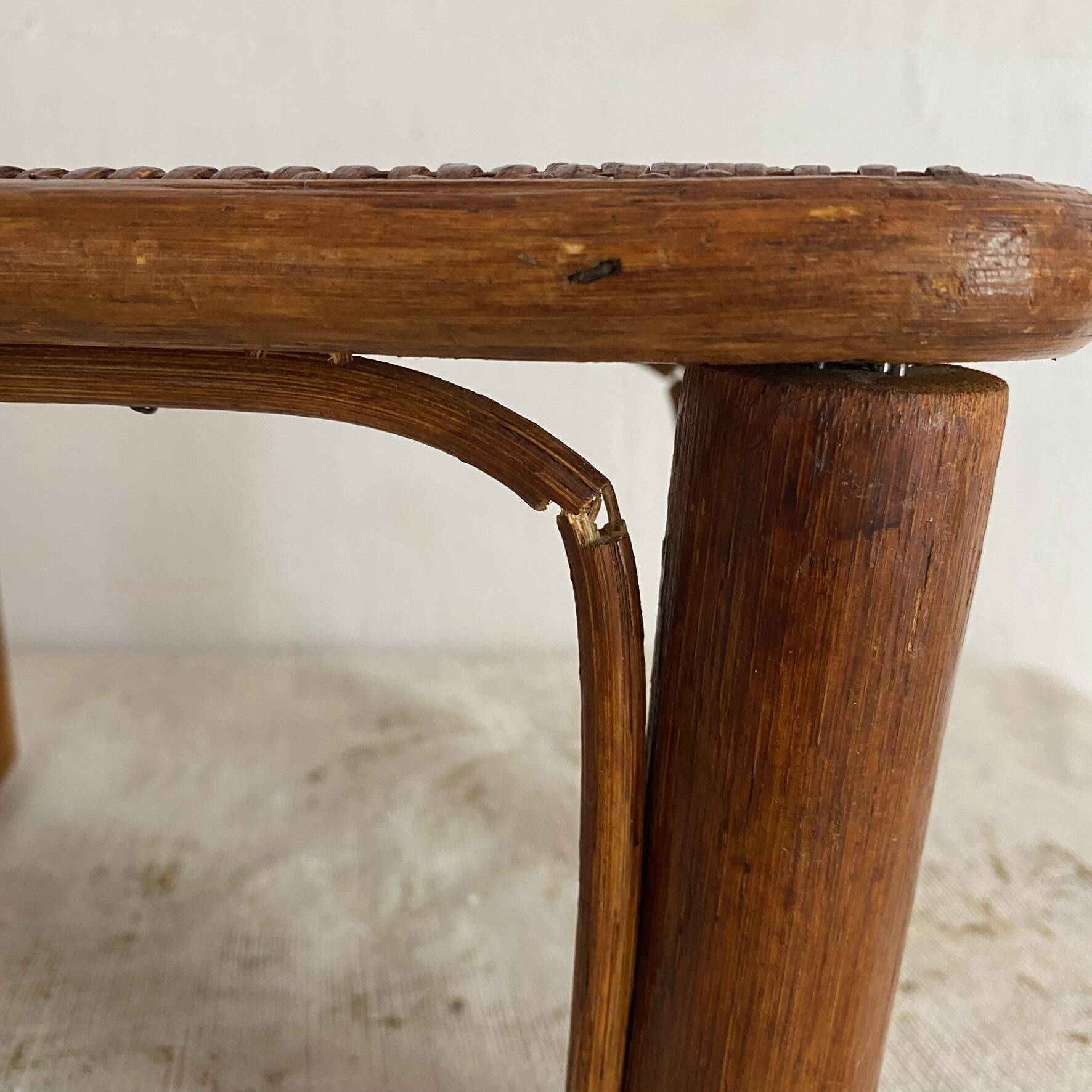 Vintage low rattan stool
