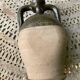Persimmon glazed terracotta oil jar
