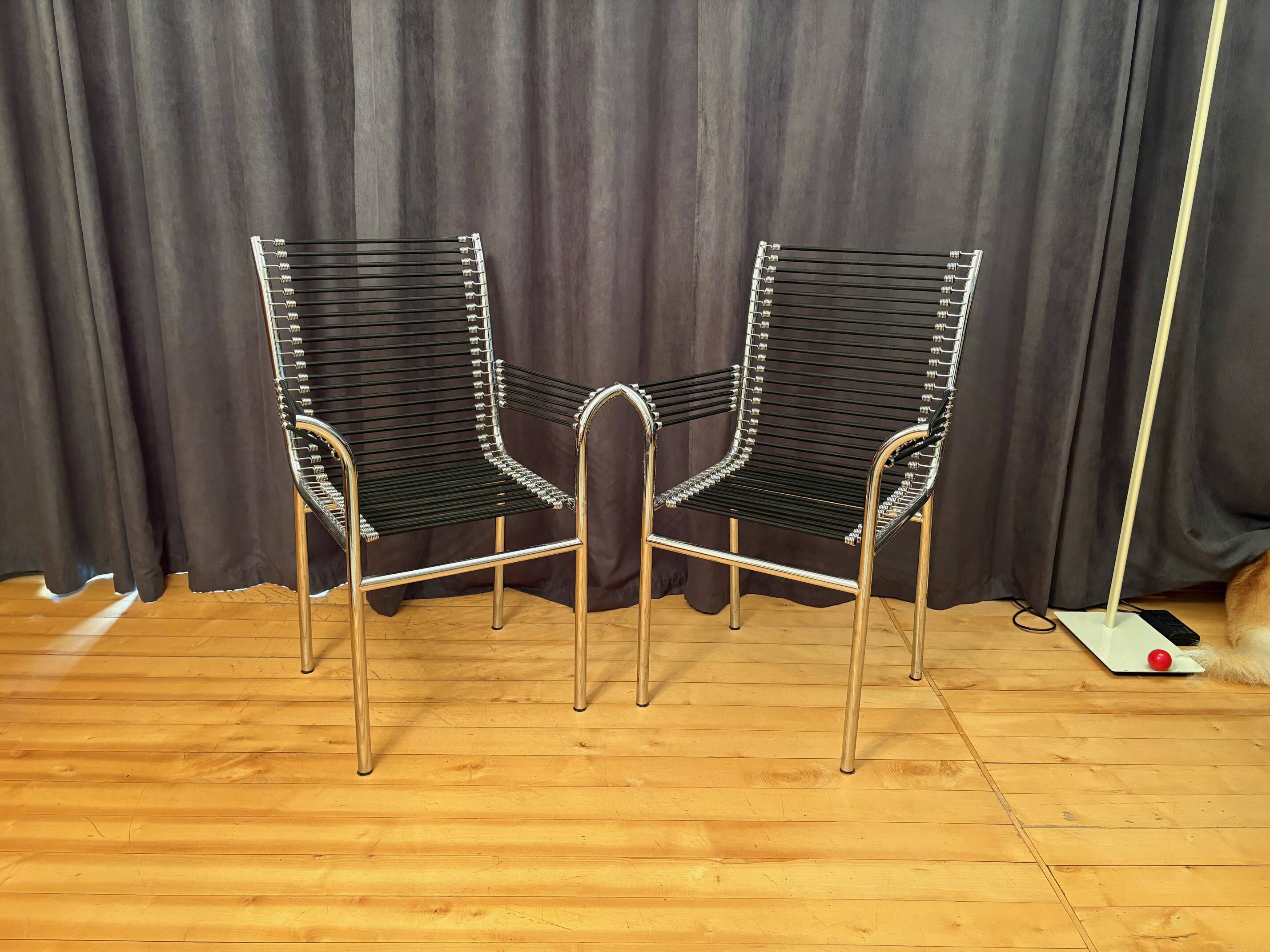 Pair of "Sandows" chairs designed by Rene Herbst, Bauhaus, France, 1980s