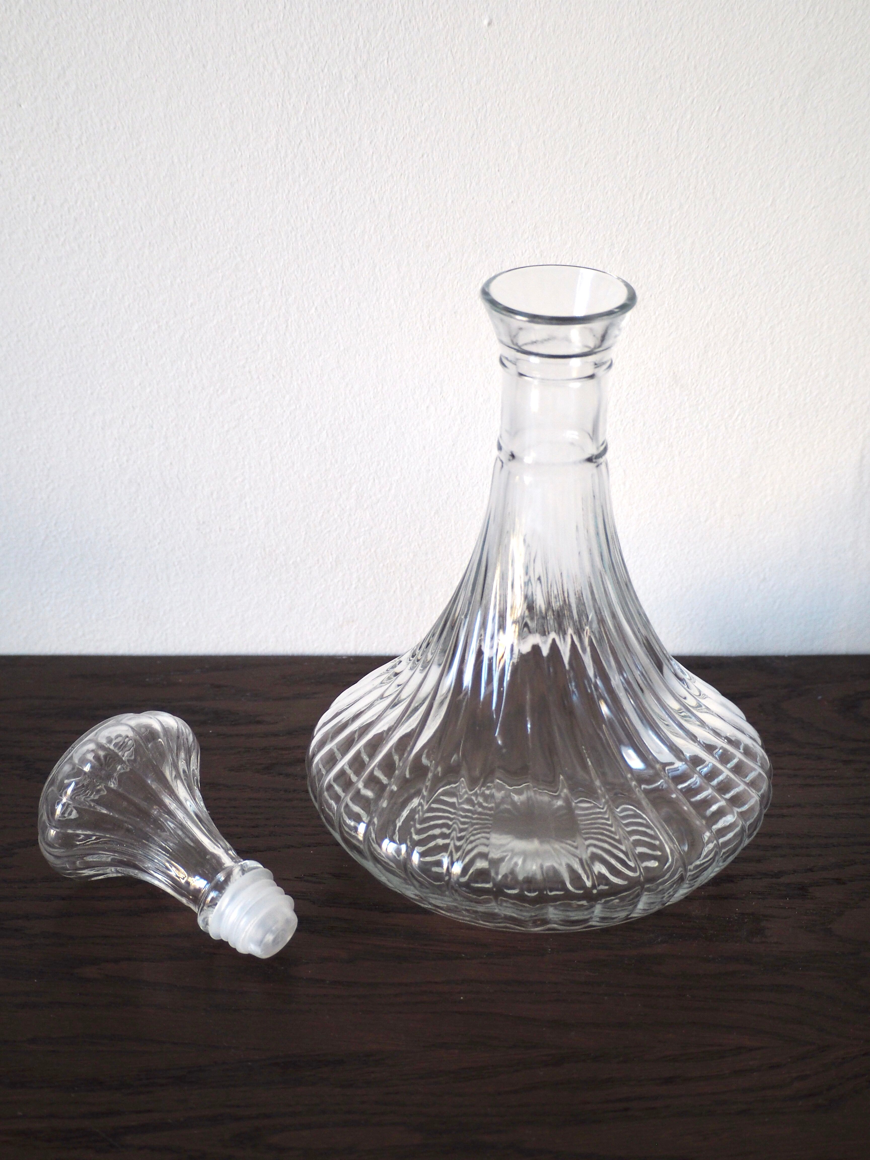 Scrolled glass wine decanter