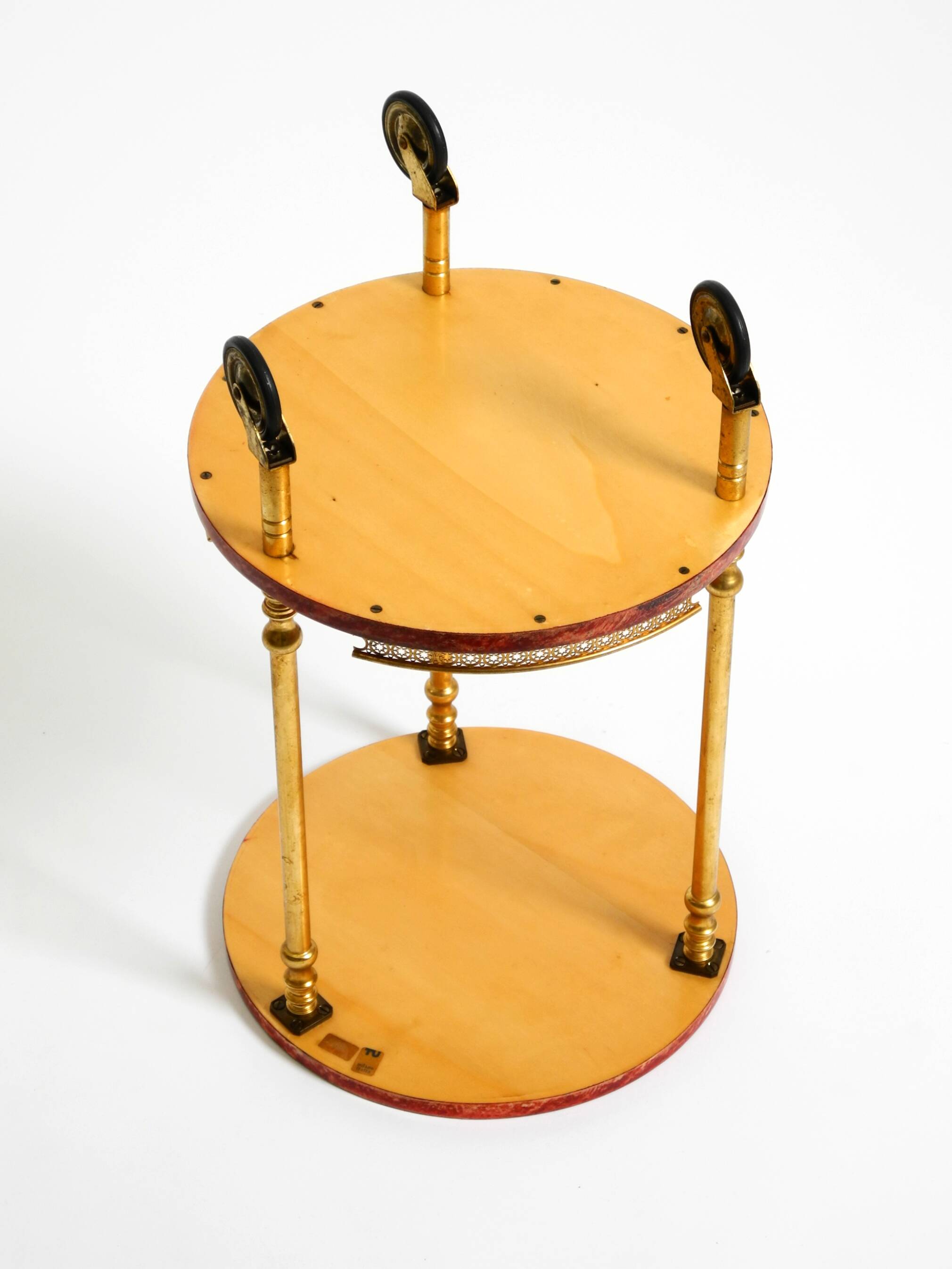 Round, small 1960s Aldo Tura serving or bar trolley in red goatskin leather