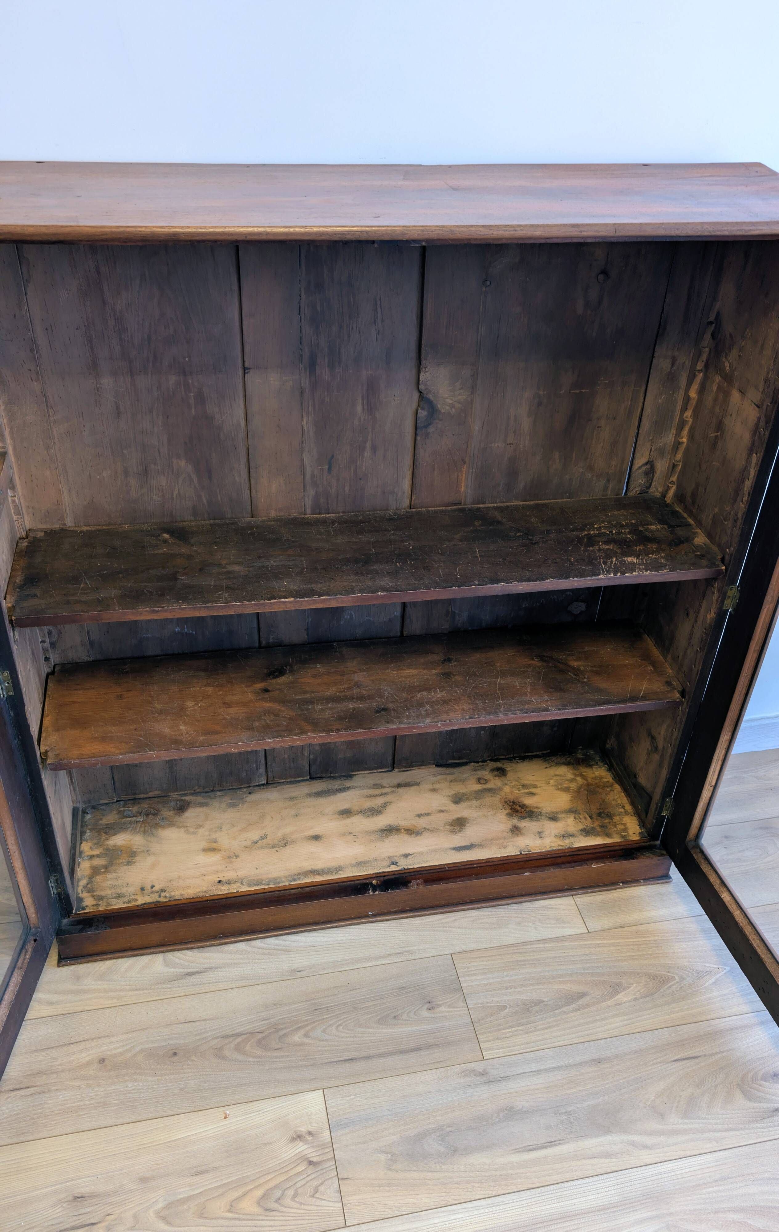 Victorian English mahogany display cabinet, elegant showcase furniture.