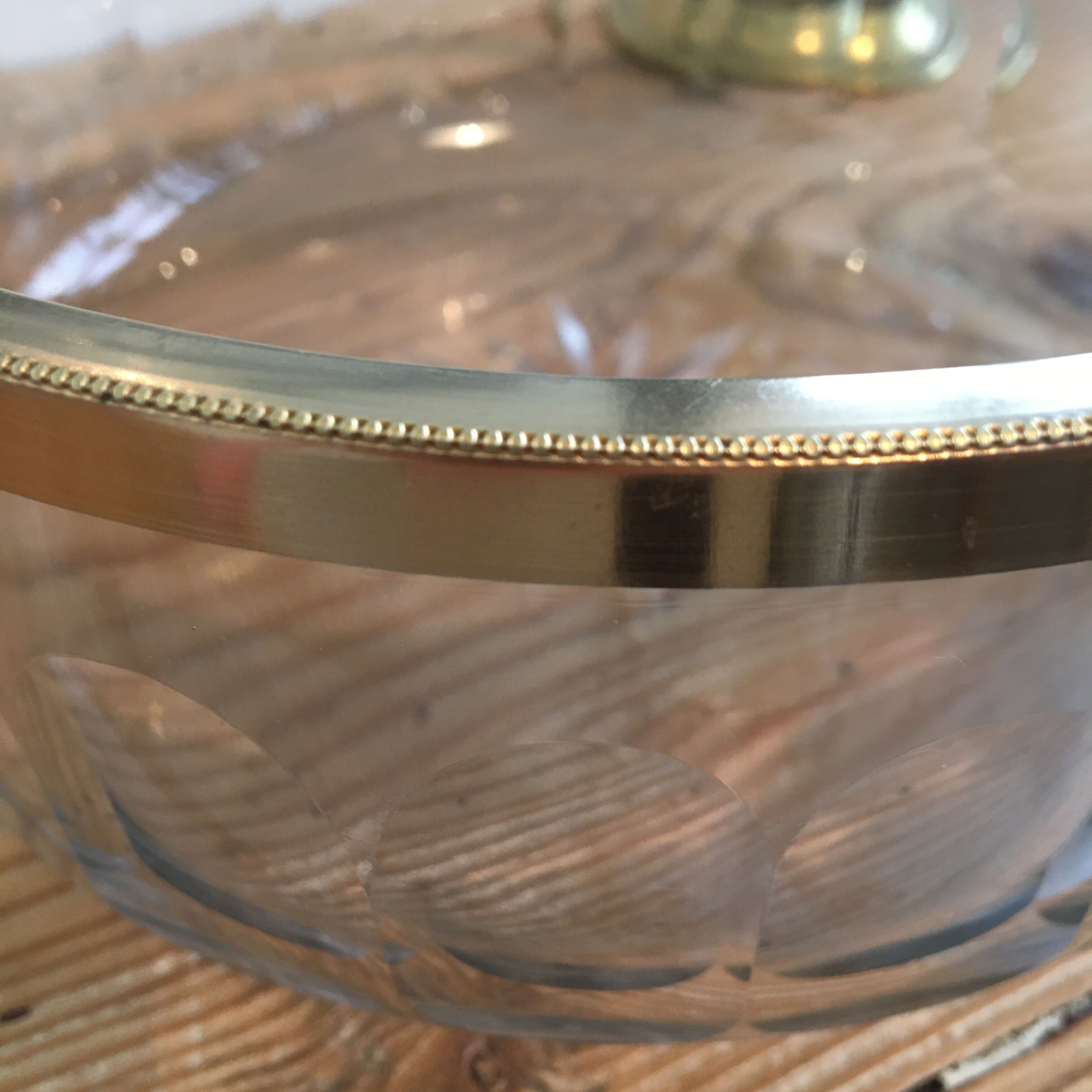 Crystal bowl trimmed surrounded gold metal