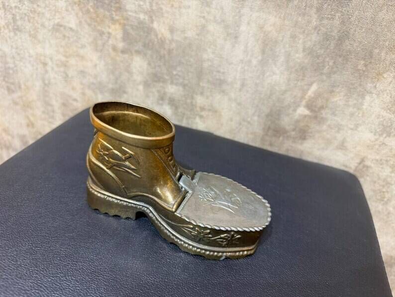 Vintage ashtray in the shape of a hiking boot with a hinged lid