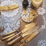 Set of 8 silver metal knives