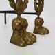 Pair of bronze fire dogs with lion paws. Early 20th century.