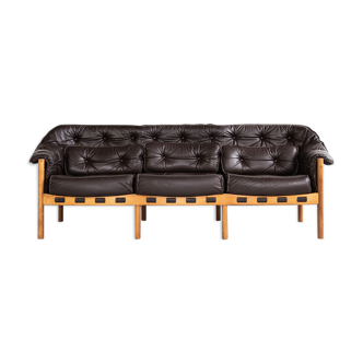 Midcentury sofa in teak and leather by Arne Norell