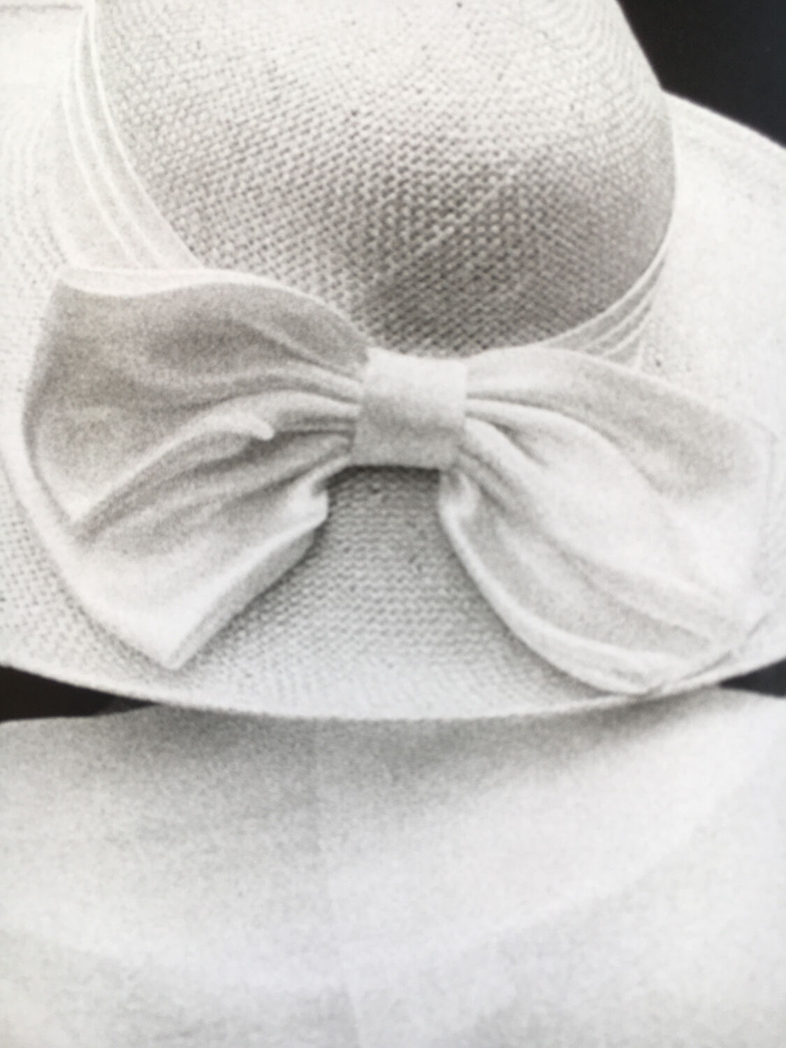 Photograph.woman with hat at funfair, 90s