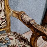 Pair of Louis XV style Baroque armchairs in gilded and carved wood circa 1900