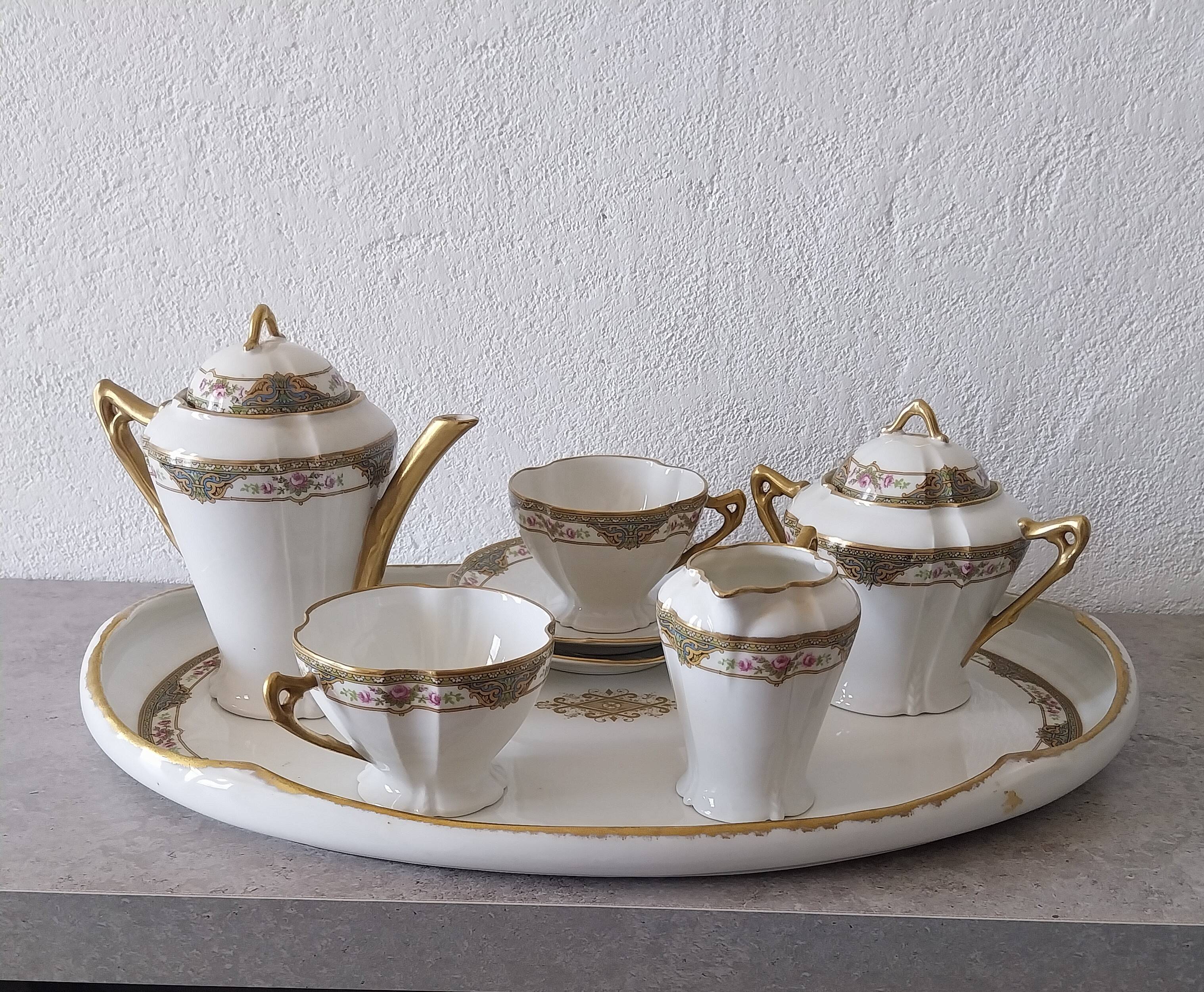 Coffee and tea service for two with its tray in Limoges porcelain.