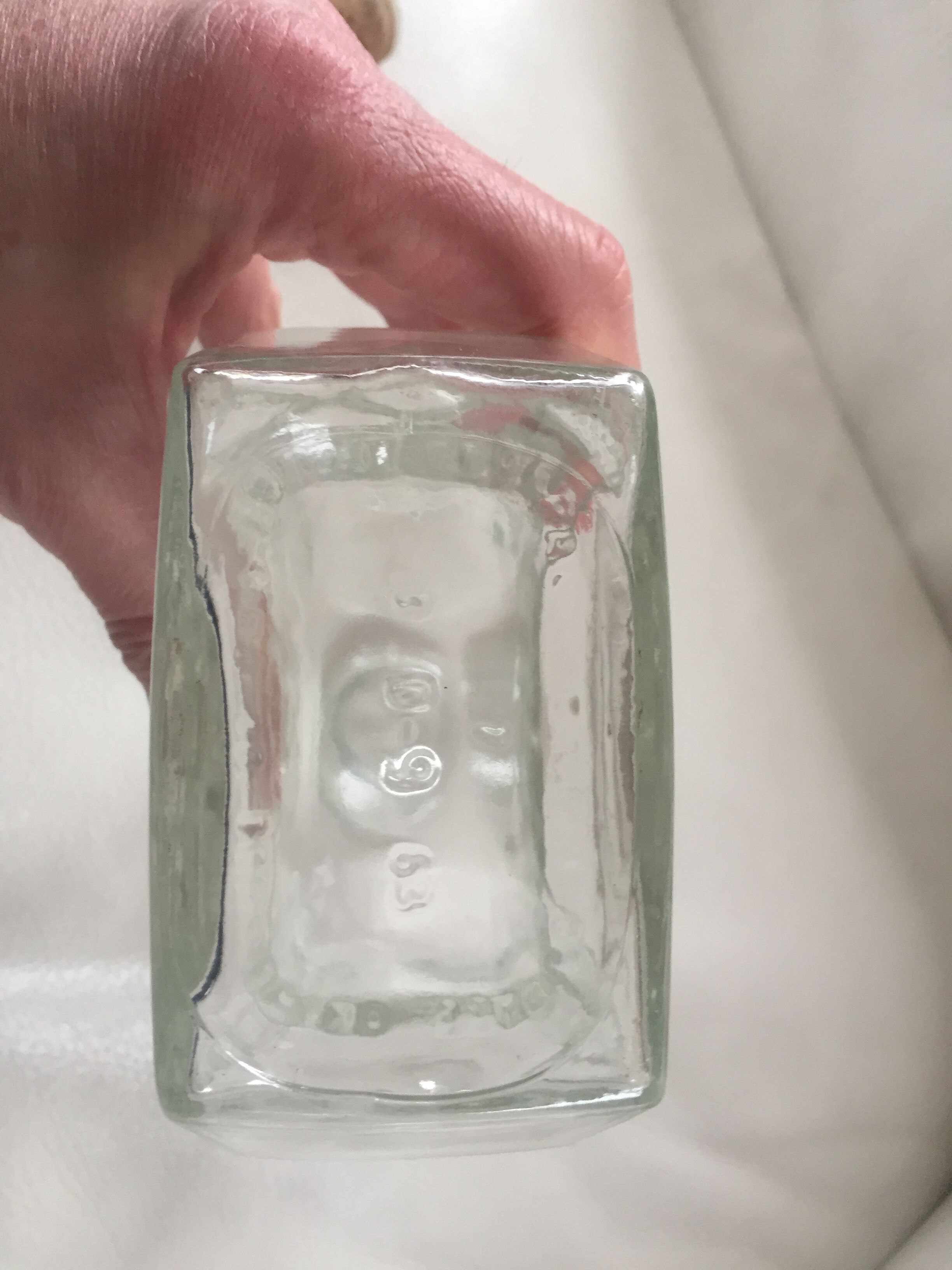 Glass bottle with coat of arms