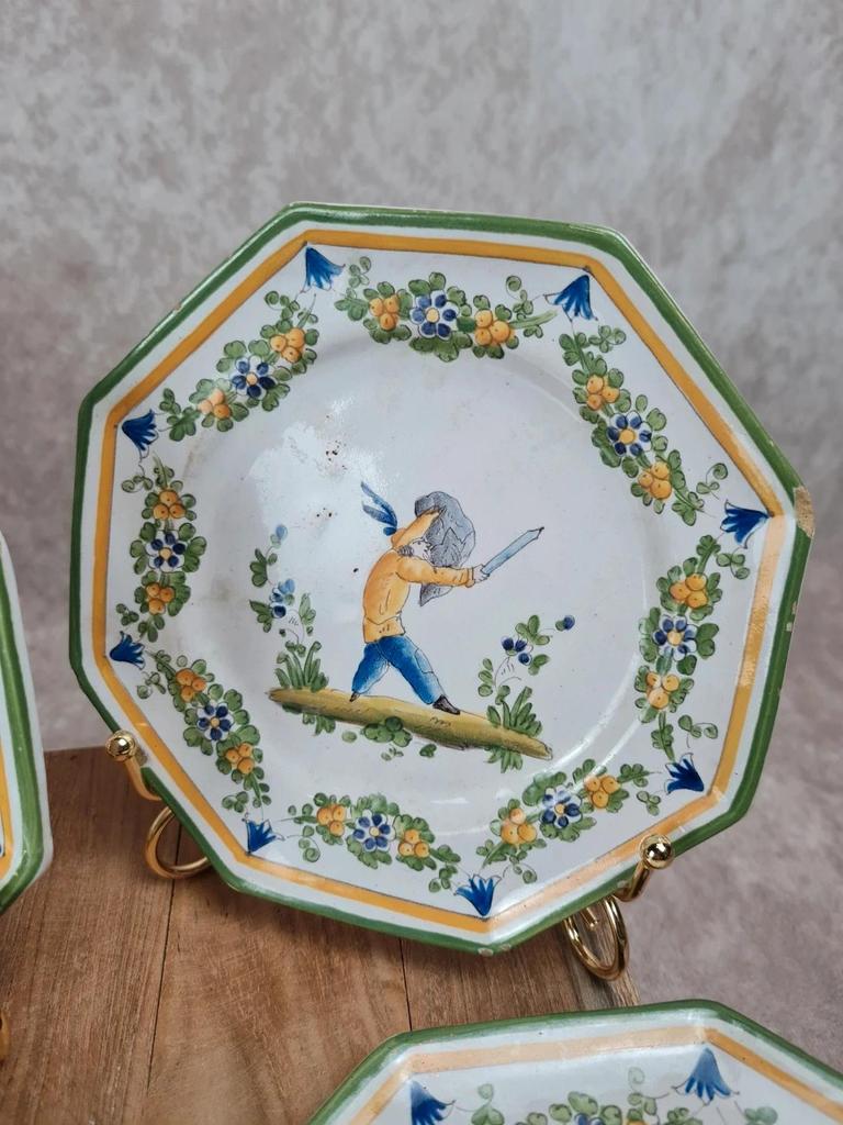 Set of 12 small antique plates by Alfred Renoleau, different designs.