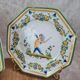 Set of 12 small antique plates by Alfred Renoleau, different designs.