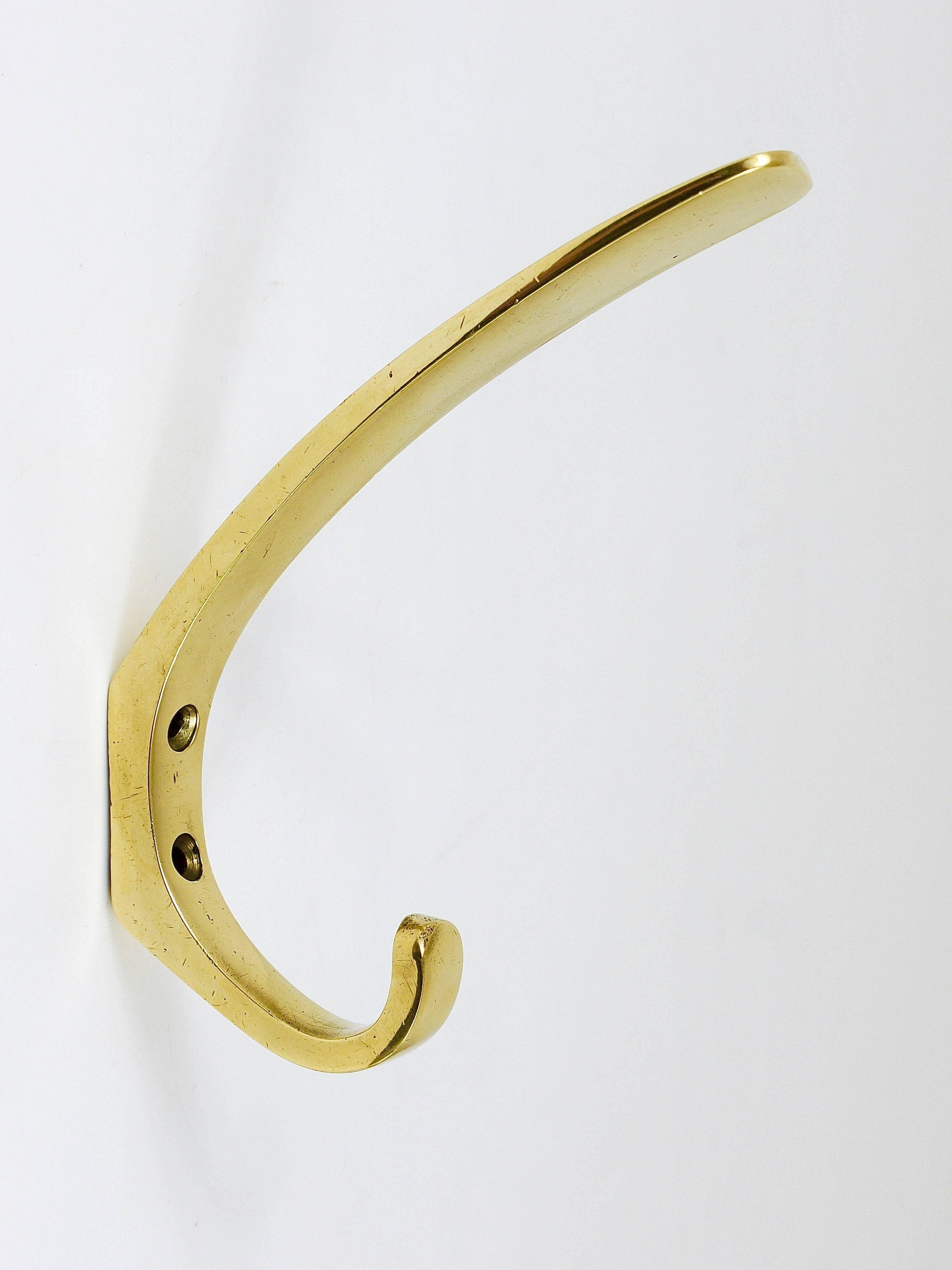9 vintage brass wall hooks by Herta Baller, Vienna, Austria, 1950s.