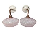 Pair of pink globe wall lights