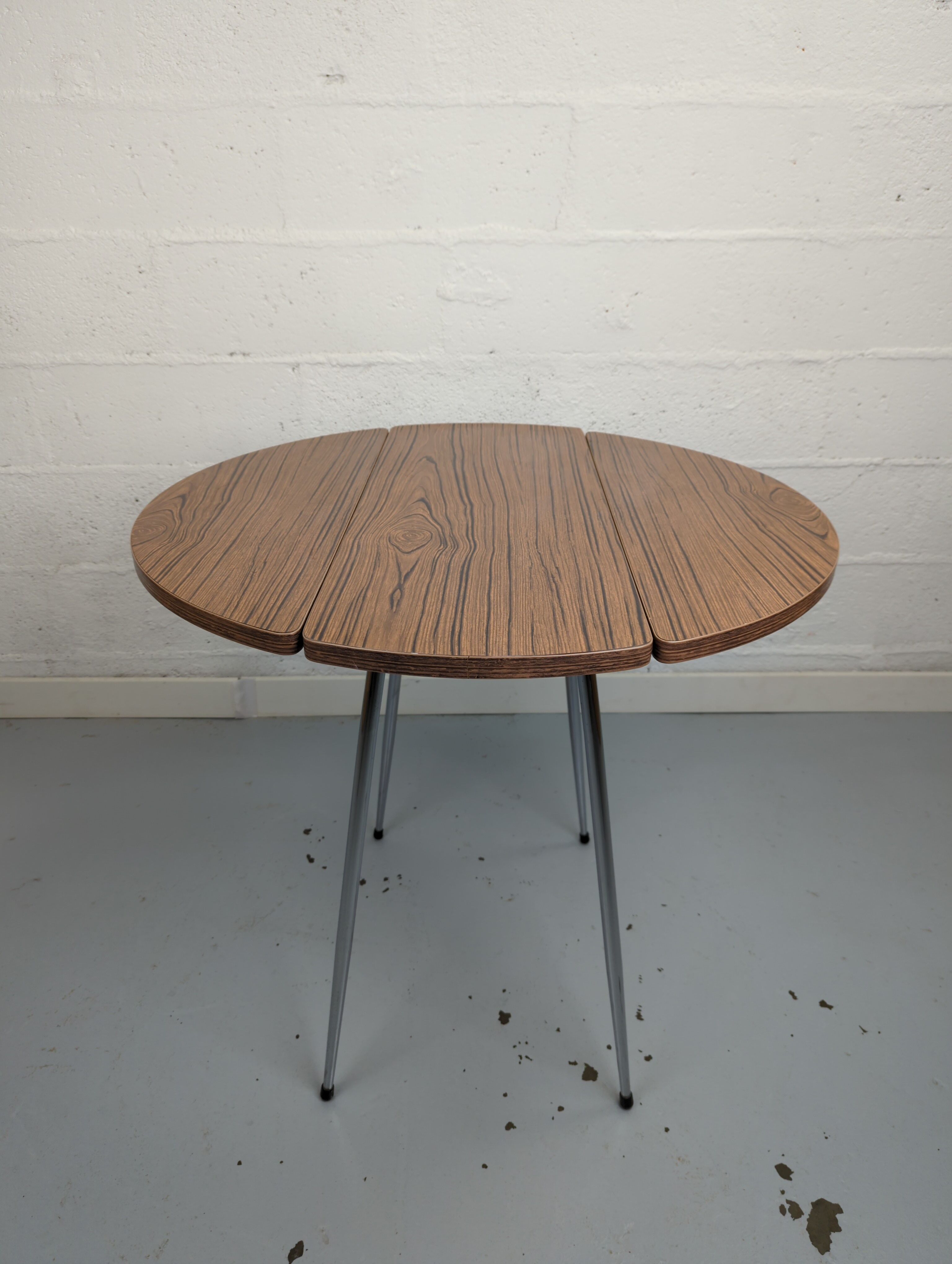 Foldable brown formica table compass legs