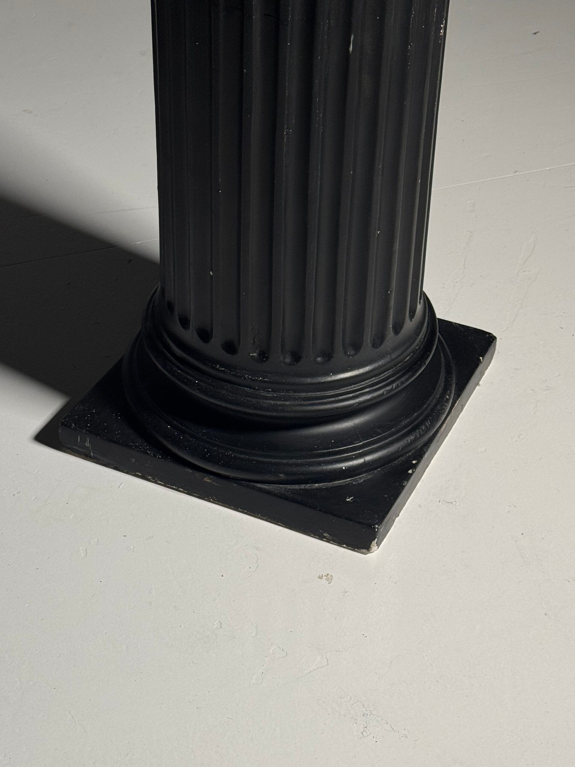 Neoclassical black plaster column