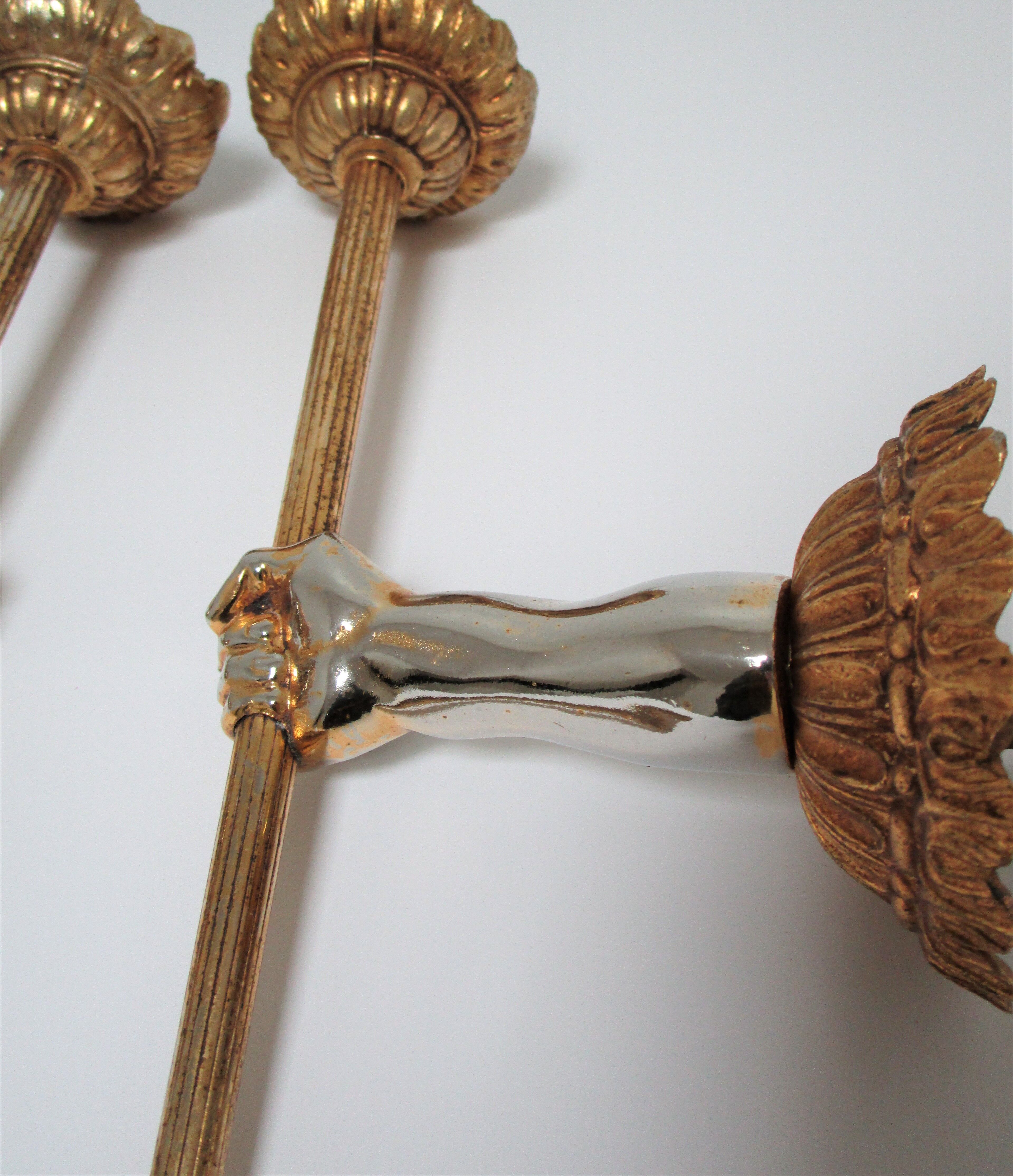 Pair of vintage patinated golden metal hand sconces