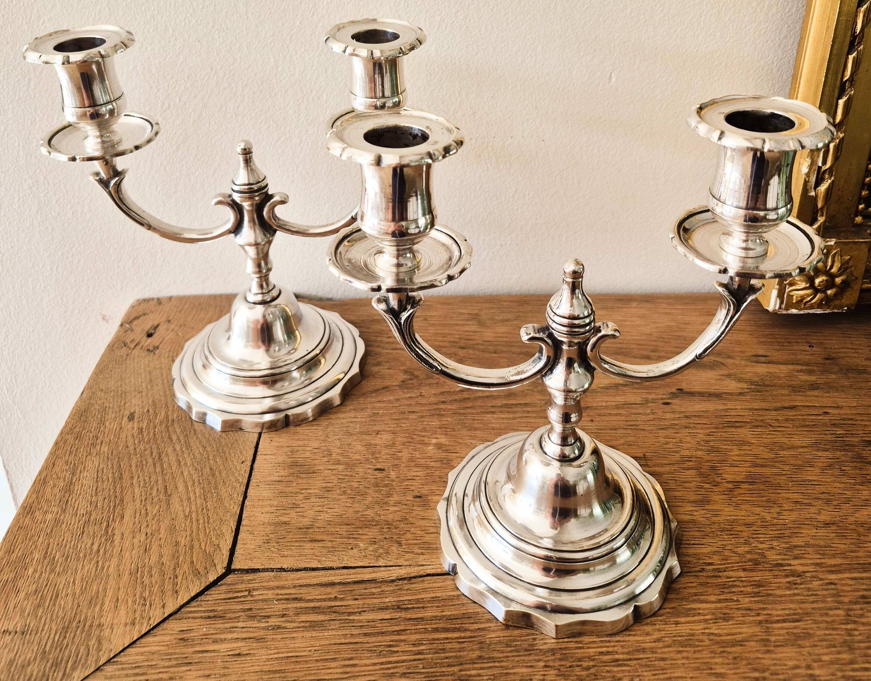 Pair of silver-plated metal candlesticks with 2 branches.