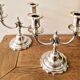 Pair of silver-plated metal candlesticks with 2 branches.