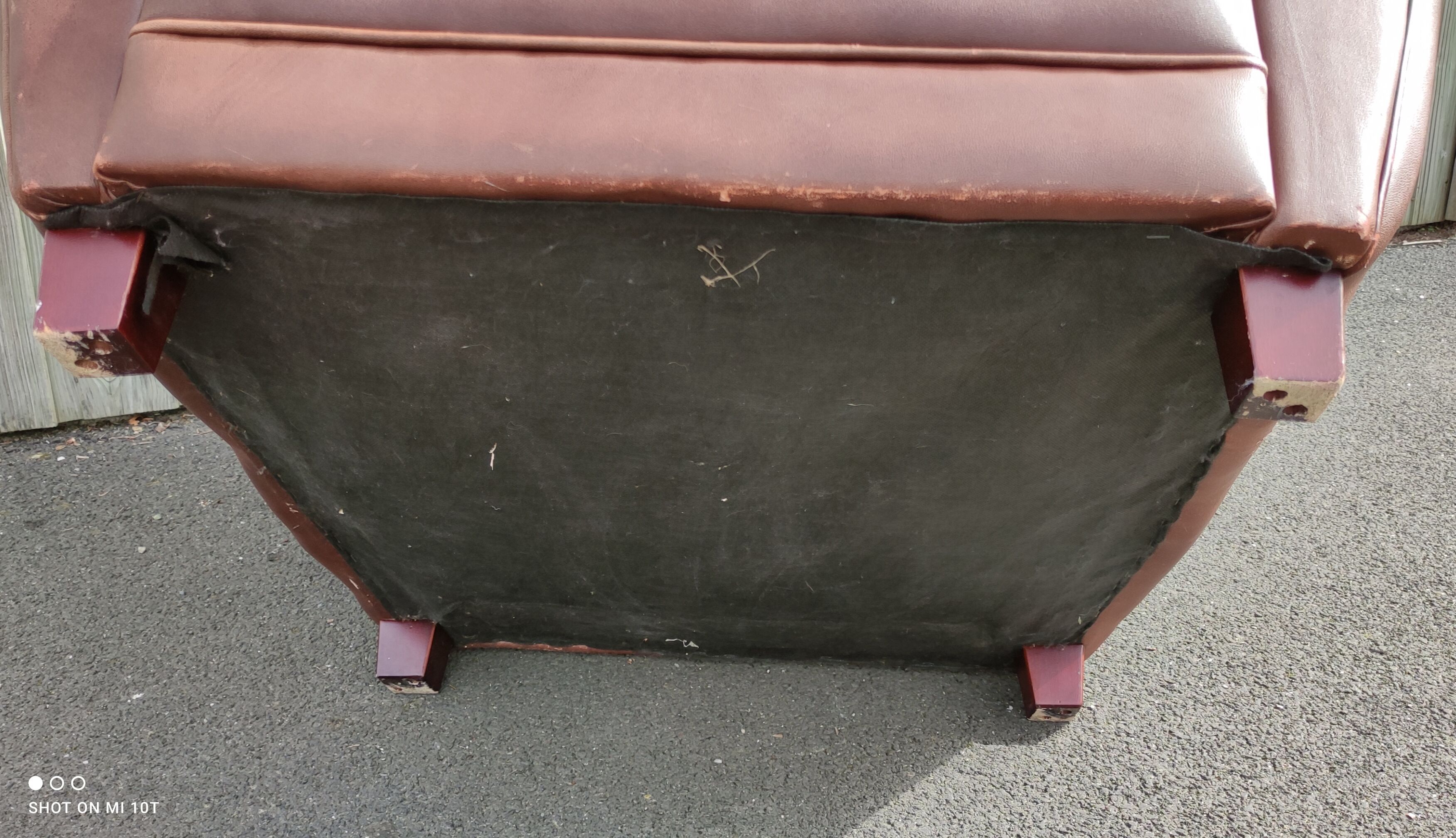 Club chair in brown leather