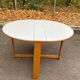 Vintage round folding Scandinavian dining table from the 1970s