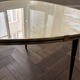 Tripod coffee table with floral design from the 1950s in brass metal and decorative top.