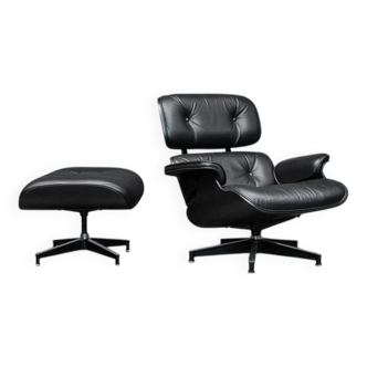 lounge chair+ ottoman  by Charles & Ray Eames