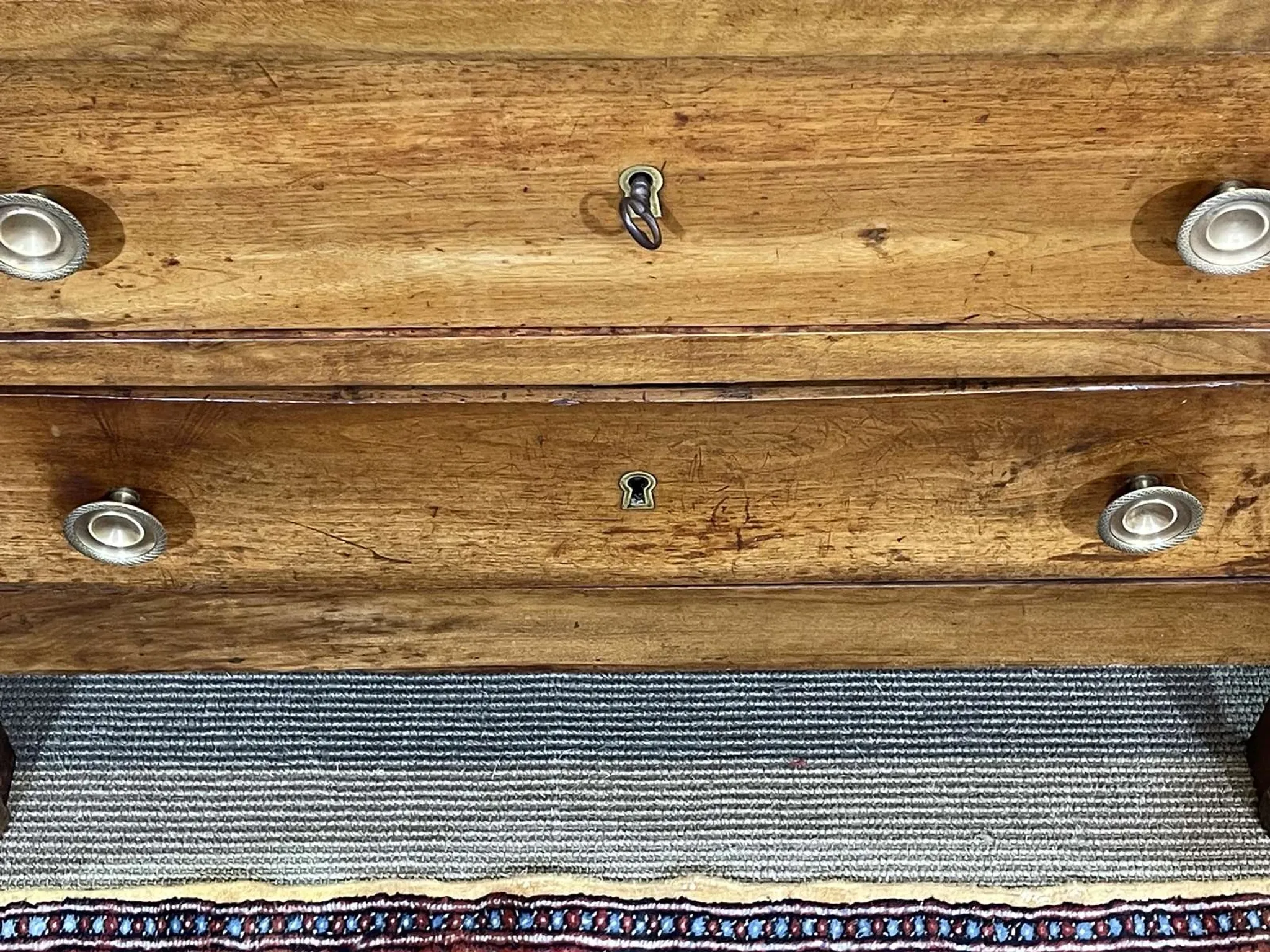 19th-century Empire commode in walnut with a grey St Anne marble top.