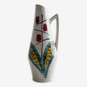 Ceramic flower pitcher.