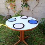 Round table in white formica and wood