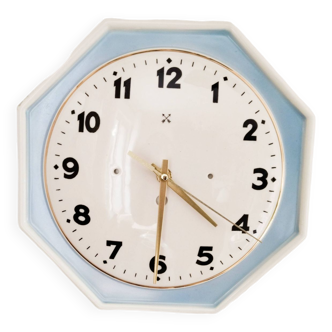 Antique clock in white and blue porcelain, gold fillet