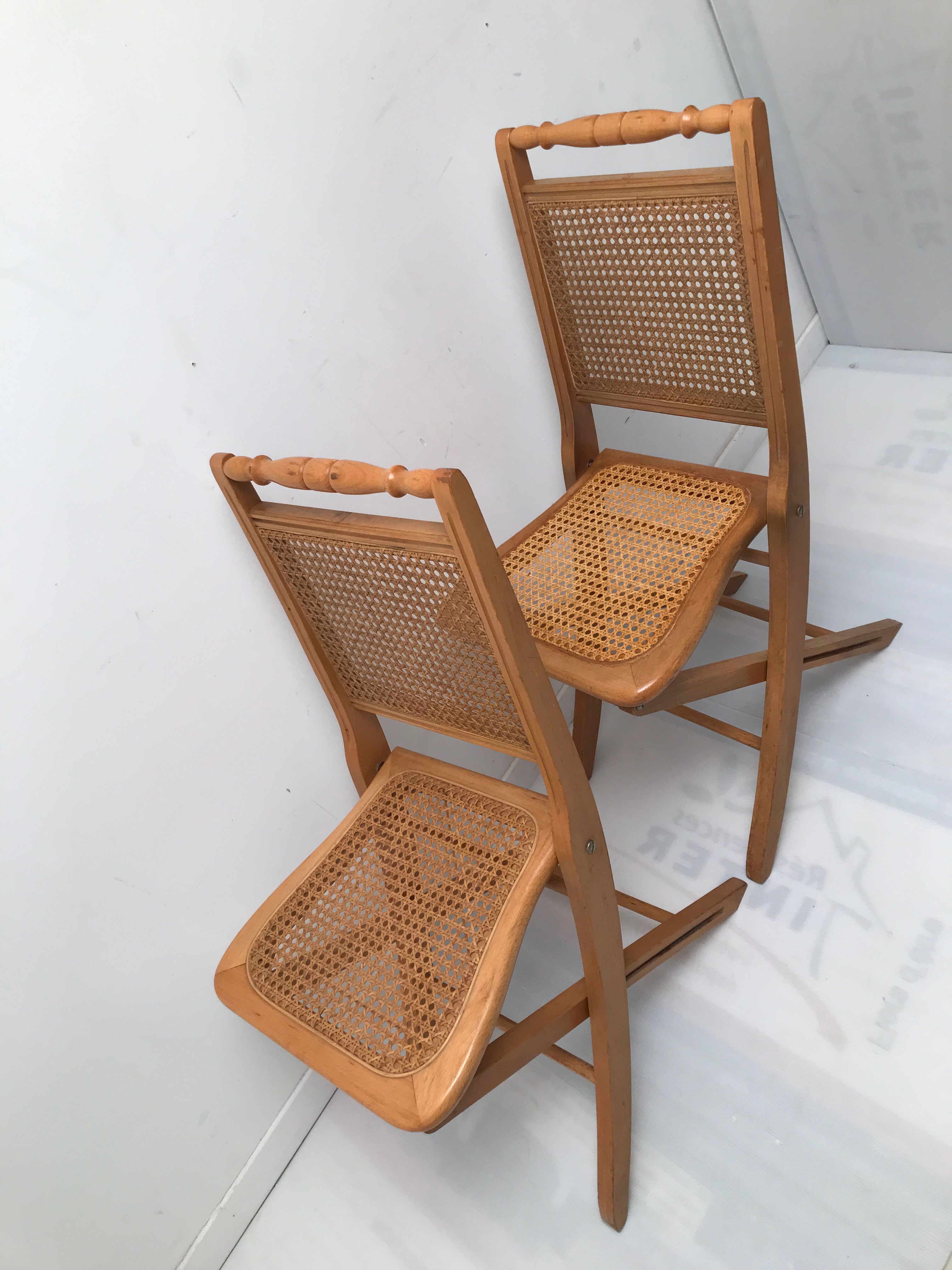 Pair vintage cannesy folding chairs