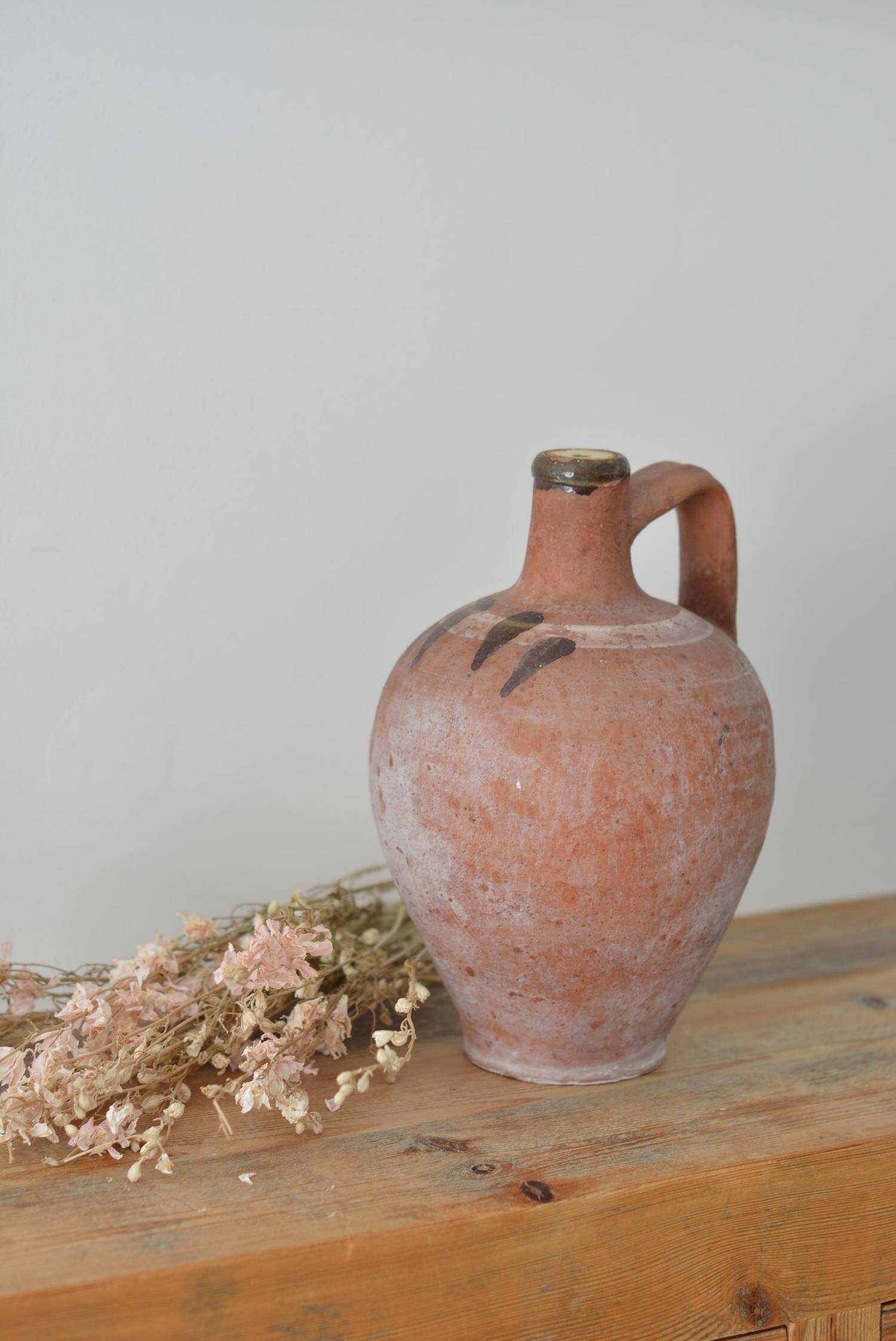 Ancient jug, terracotta pitcher from the Mediterranean.